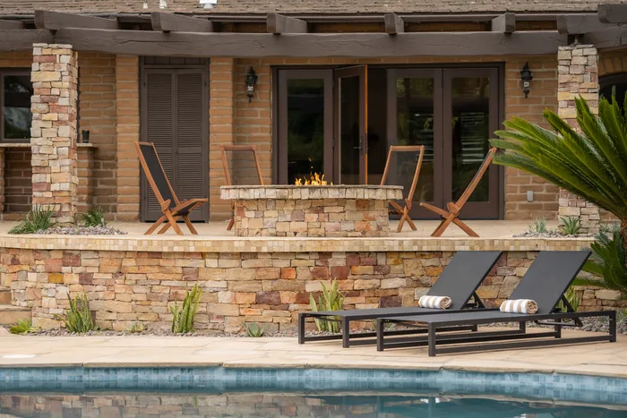 Pool terrace and exterior lighting at a renovated Escondido estate wired by J.I.C. Electric